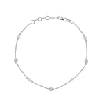 Bracelet avec mini perles et diamants sertis clos espacés